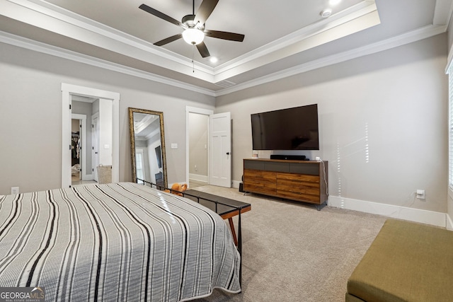 2441 Waterside Dr, Monroe, GA 30655 - carpeted bedroom with a tray ceiling, crown molding, baseboards, recessed lighting, and ceiling fan