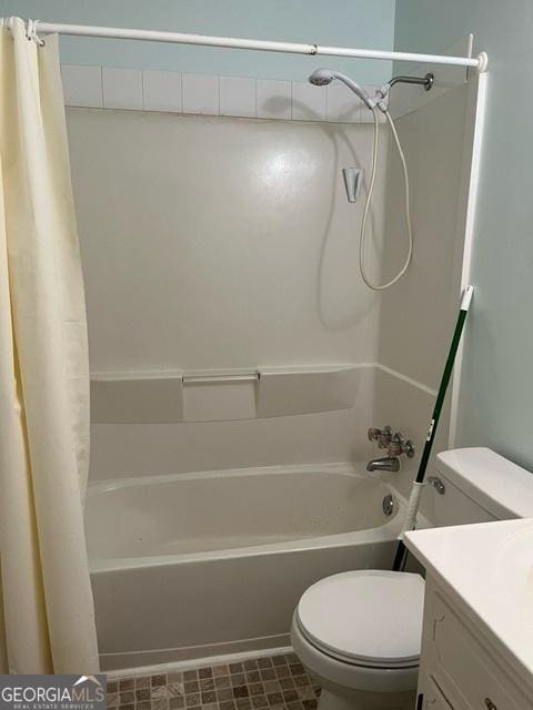304 Tunis Rd, Mcdonough, GA 30253 - bathroom featuring toilet, shower / bath combo, and vanity