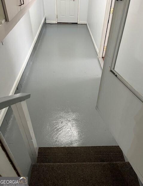 304 Tunis Rd, Mcdonough, GA 30253 - stairs with concrete flooring