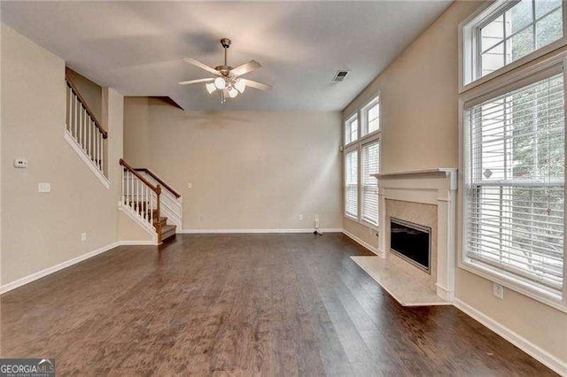 2280 Copper Trail Ln, Buford, GA 30519 - unfurnished living room featuring stairway, dark wood-type flooring, ceiling fan, and baseboards