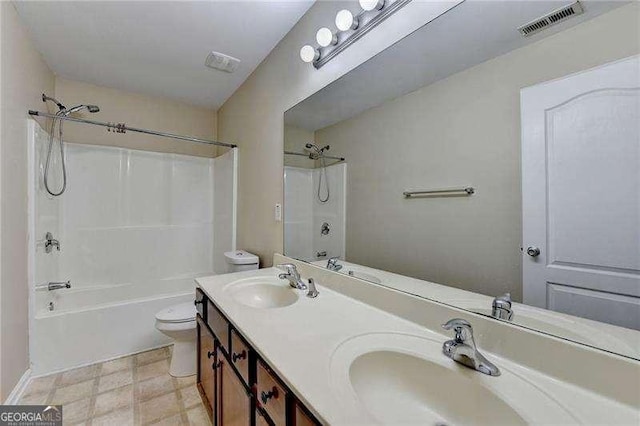 2280 Copper Trail Ln, Buford, GA 30519 - full bath featuring tub / shower combination, toilet, double vanity, and tile patterned floors
