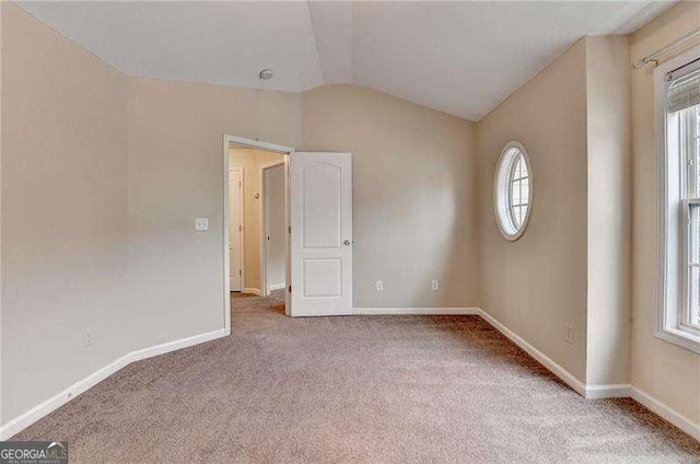 2280 Copper Trail Ln, Buford, GA 30519 - carpeted empty room with plenty of natural light, vaulted ceiling, and baseboards