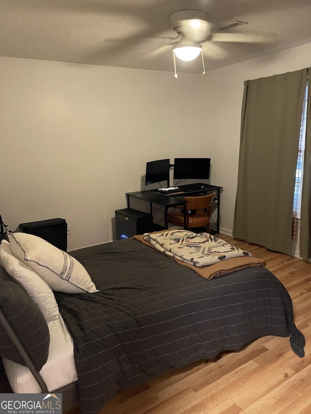 211 Groveland Dr, Peachtree City, GA 30269 - bedroom featuring wood finished floors and ceiling fan