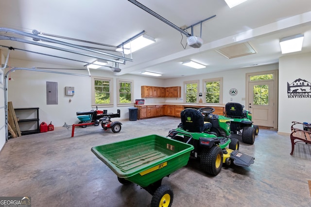 1315 Chimney Mountain Flats Trl, Clarkesville, GA 30523 - garage featuring a garage door opener and electric panel