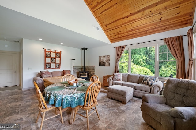 1315 Chimney Mountain Flats Trl, Clarkesville, GA 30523 - dining space with stone finish floors, a wood stove, wood ceiling, high vaulted ceiling, and recessed lighting