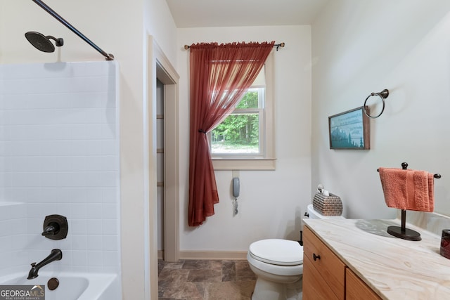 1315 Chimney Mountain Flats Trl, Clarkesville, GA 30523 - full bathroom with toilet, vanity, washtub / shower combination, baseboards, and stone finish flooring
