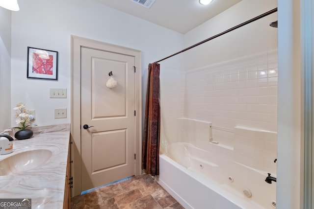 1315 Chimney Mountain Flats Trl, Clarkesville, GA 30523 - full bathroom with a combined bath / shower with jetted tub, vanity, and stone finish floors