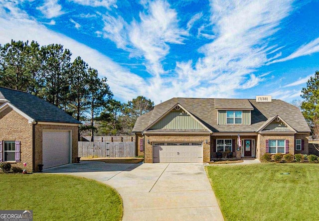 125 Kayla Ct, Locust Grove, GA 30248 - craftsman inspired home featuring concrete driveway, brick siding, and a garage