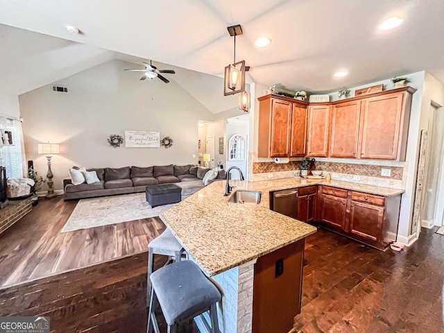 125 Kayla Ct, Locust Grove, GA 30248 - kitchen with a sink, a peninsula, ceiling fan, open floor plan, and dishwasher