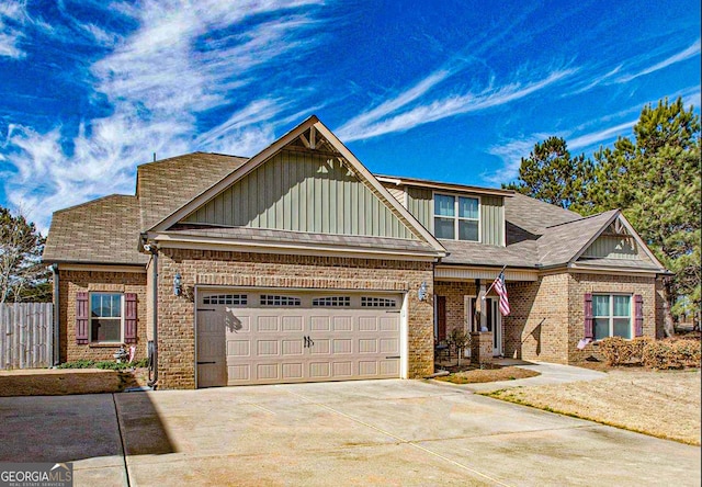 125 Kayla Ct, Locust Grove, GA 30248 - craftsman inspired home featuring board and batten siding, concrete driveway, an attached garage, and brick siding