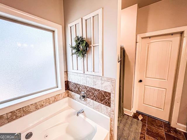 125 Kayla Ct, Locust Grove, GA 30248 - bathroom featuring a garden tub