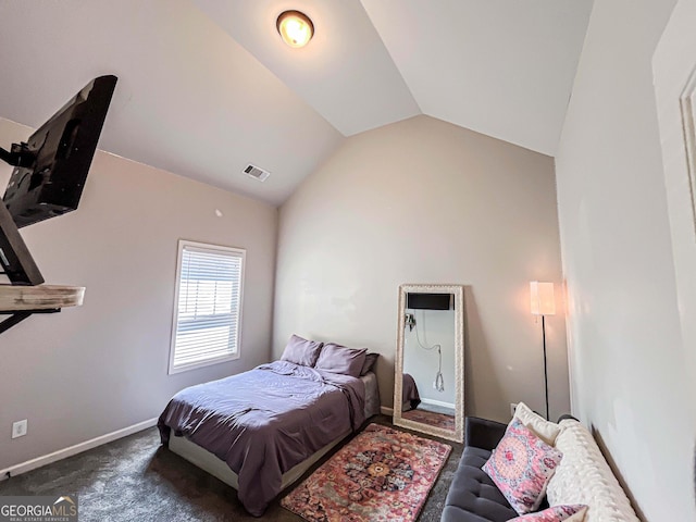 125 Kayla Ct, Locust Grove, GA 30248 - bedroom featuring vaulted ceiling, carpet flooring, and baseboards