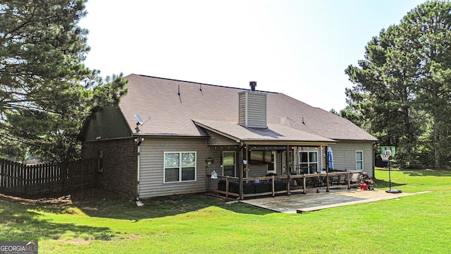 125 Kayla Ct, Locust Grove, GA 30248 - back of house featuring a patio and a chimney