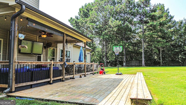 125 Kayla Ct, Locust Grove, GA 30248 - wooden terrace with a yard and a ceiling fan