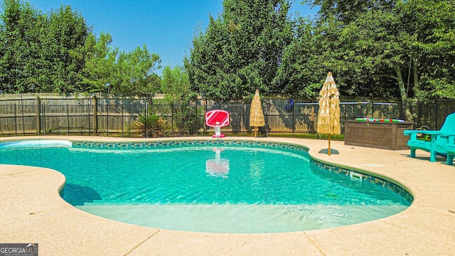 125 Kayla Ct, Locust Grove, GA 30248 - view of swimming pool featuring a fenced backyard and a patio