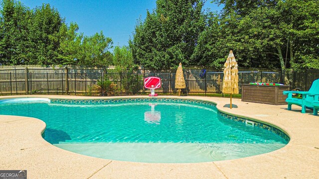 125 Kayla Ct, Locust Grove, GA 30248 - view of swimming pool featuring a fenced backyard and a patio