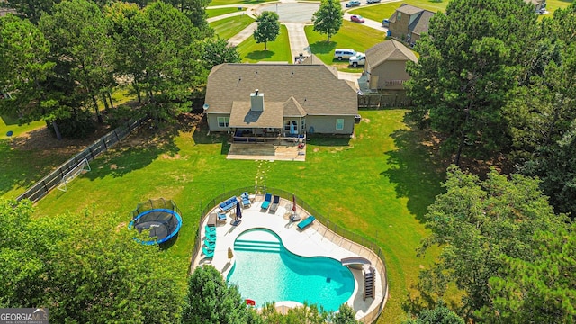 125 Kayla Ct, Locust Grove, GA 30248 - view from above of property with a pool area and a tree filled landscape