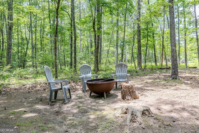 196 Elm St, Menlo, GA 30731 - view of yard with a forest view and a fire pit