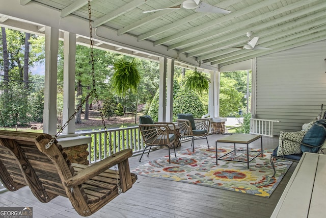 3119 Conyers St SE, Covington, GA 30014 - porch featuring a ceiling fan and an outdoor hangout area