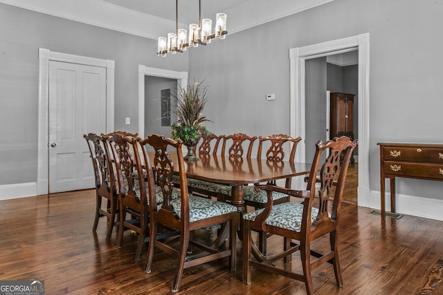 3119 Conyers St SE, Covington, GA 30014 - dining room featuring wood finished floors and baseboards