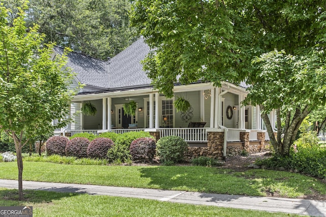 3119 Conyers St SE, Covington, GA 30014 - view of front of home featuring a porch, roof with shingles, and a front yard