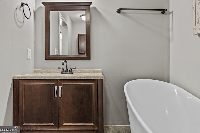 3119 Conyers St SE, Covington, GA 30014 - full bathroom featuring a freestanding bath and vanity