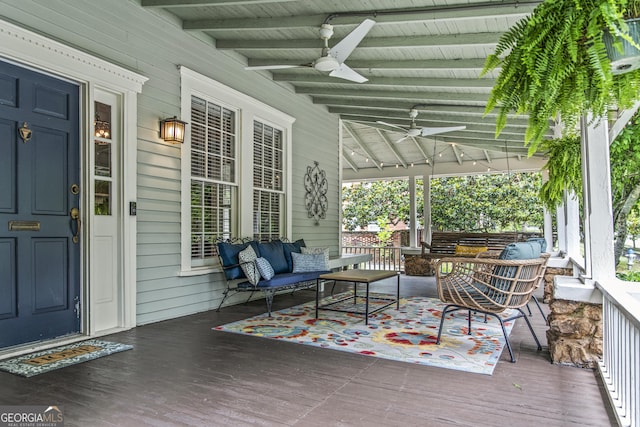 3119 Conyers St SE, Covington, GA 30014 - porch featuring a ceiling fan and an outdoor living space