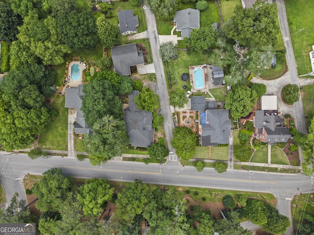 3119 Conyers St SE, Covington, GA 30014 - aerial view of property and surrounding area with a pool area and nearby suburban area
