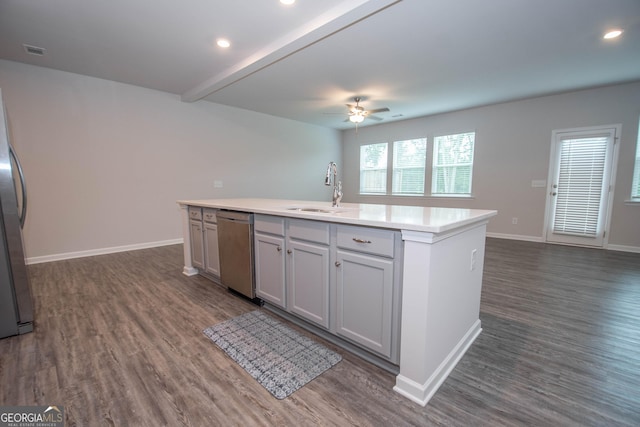 26 Sepia Oak Dr, Newnan, GA 30263 - kitchen featuring a sink, appliances with stainless steel finishes, a ceiling fan, open floor plan, and a kitchen island with sink
