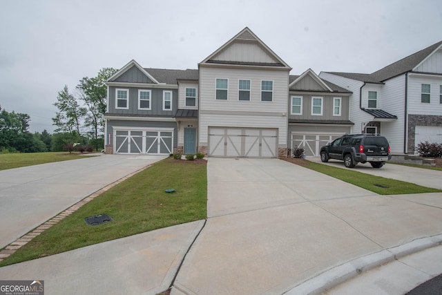 26 Sepia Oak Dr, Newnan, GA 30263 - view of front of home featuring board and batten siding, a garage, stone siding, concrete driveway, and a front lawn