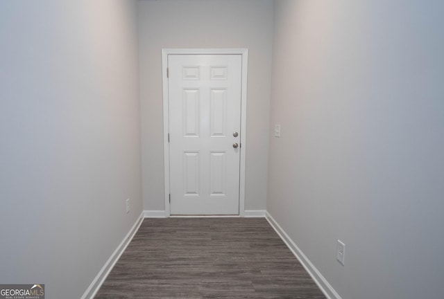 26 Sepia Oak Dr, Newnan, GA 30263 - doorway to outside featuring dark wood-type flooring and baseboards