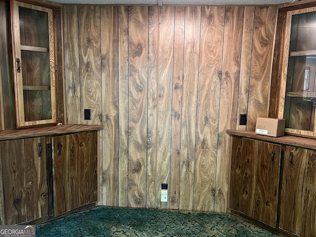 218 Helen Rd, Covington, GA 30016 - detailed view of wood walls and carpet flooring