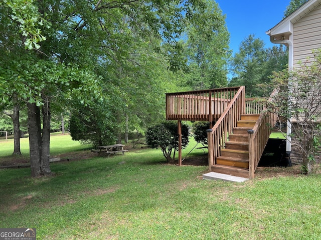 3725 Concord Rd, Newborn, GA 30056 - view of green lawn featuring stairs and a deck