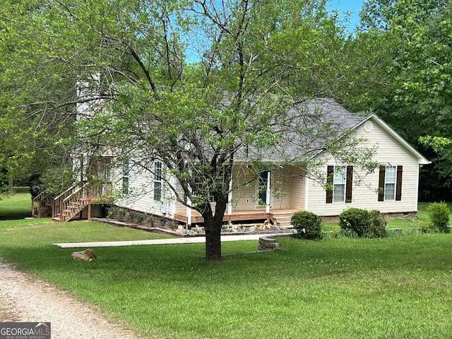 3725 Concord Rd, Newborn, GA 30056 - view of front of property with a front yard and covered porch