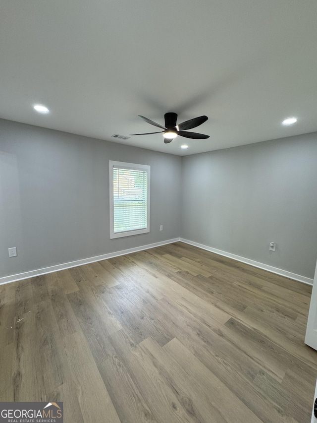 1340 Stoneleigh Way, Stone Mountain, GA 30088 - spare room with recessed lighting, a ceiling fan, and wood finished floors