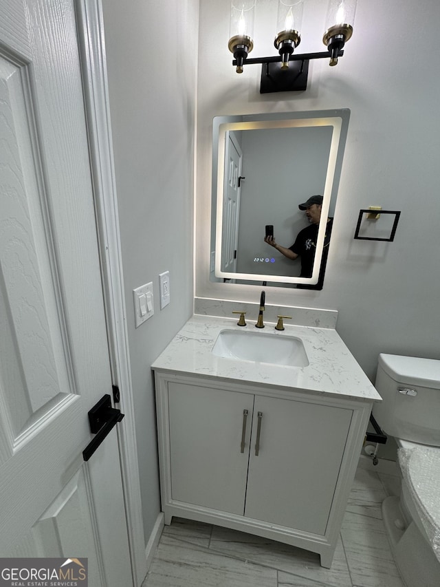 1340 Stoneleigh Way, Stone Mountain, GA 30088 - bathroom with vanity and toilet
