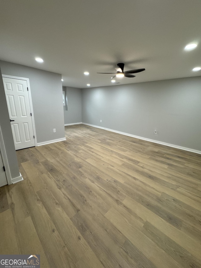 1340 Stoneleigh Way, Stone Mountain, GA 30088 - below grade area featuring recessed lighting, a ceiling fan, and wood finished floors