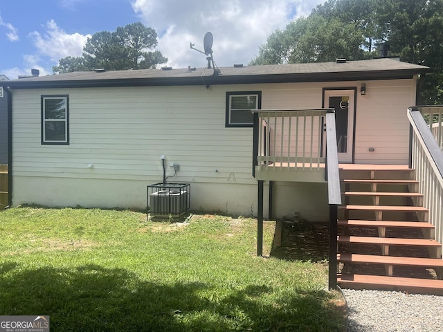 1340 Stoneleigh Way, Stone Mountain, GA 30088 - rear view of house with stairs, a lawn, and a deck