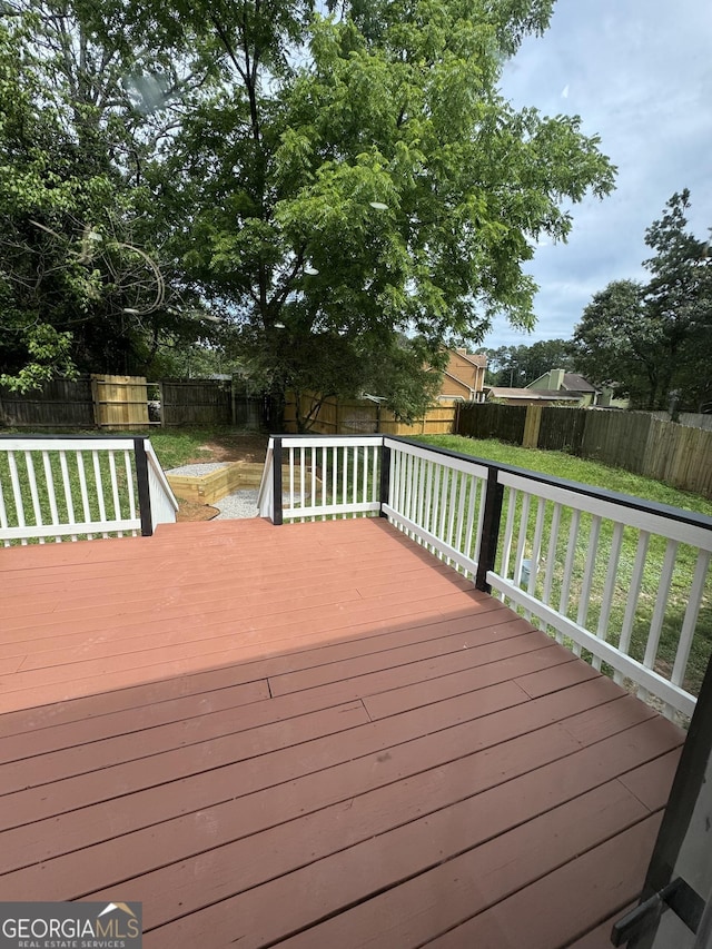 1340 Stoneleigh Way, Stone Mountain, GA 30088 - wooden terrace with a fenced backyard