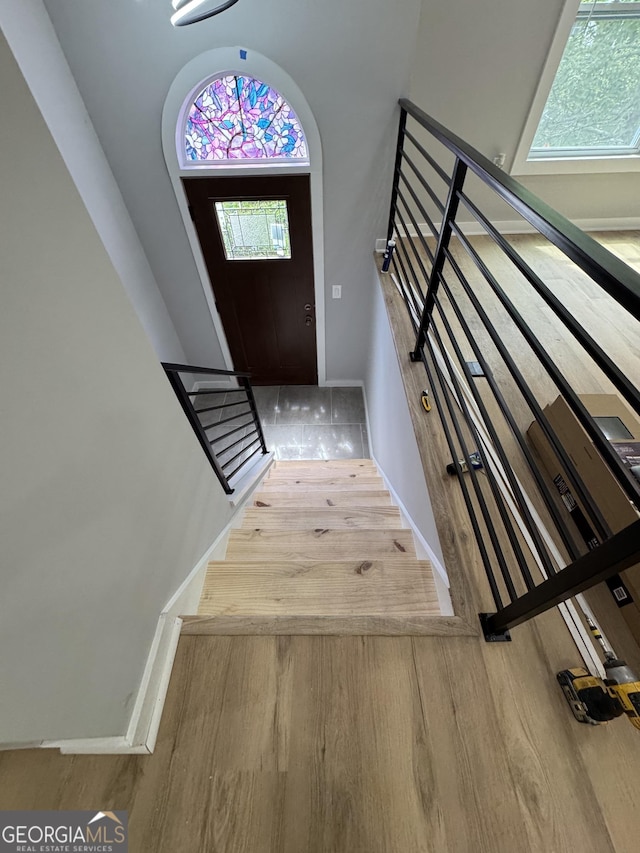 1340 Stoneleigh Way, Stone Mountain, GA 30088 - staircase with wood finished floors and baseboards