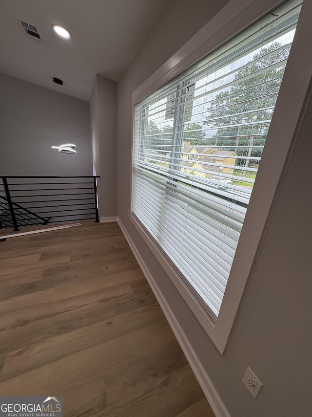 1340 Stoneleigh Way, Stone Mountain, GA 30088 - corridor with an upstairs landing, wood finished floors, and recessed lighting