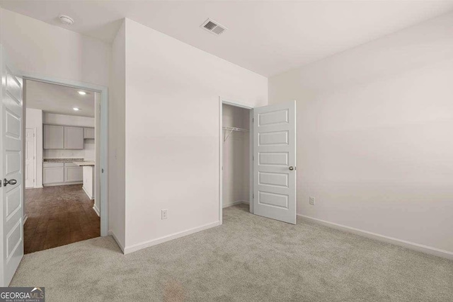 11884 Aukerman Way, Hampton, GA 30228 - unfurnished bedroom featuring carpet, baseboards, and a closet