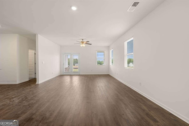 11884 Aukerman Way, Hampton, GA 30228 - unfurnished room with ceiling fan, dark wood finished floors, baseboards, and recessed lighting
