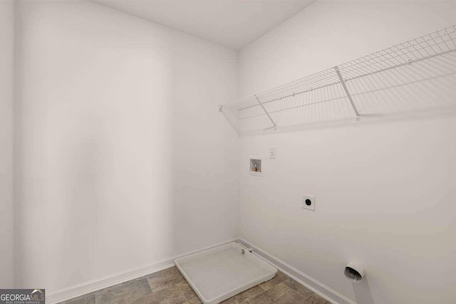 11884 Aukerman Way, Hampton, GA 30228 - laundry room with washer hookup, hookup for an electric dryer, and baseboards