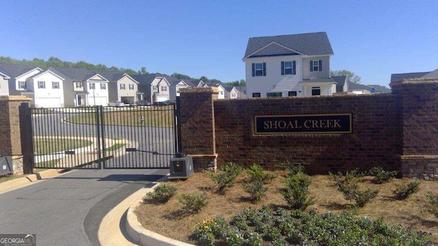 11884 Aukerman Way, Hampton, GA 30228 - community sign featuring a residential view and a gate