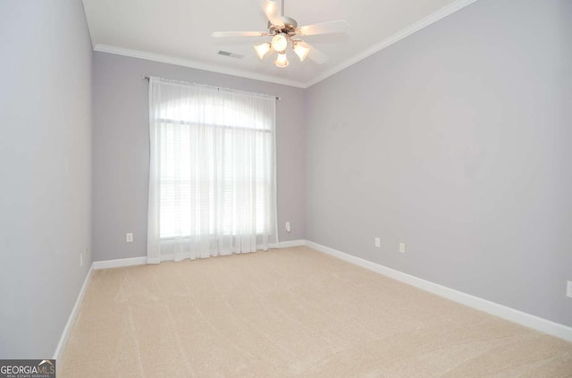 1570 Woodberry Run Dr, Snellville, GA 30078 - empty room featuring crown molding, a ceiling fan, and light carpet