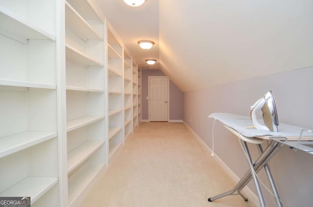 1570 Woodberry Run Dr, Snellville, GA 30078 - walk in closet featuring lofted ceiling and carpet flooring
