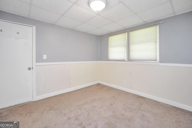 172B Hummingbird Ln, Jackson, GA 30233 - spare room with a drop ceiling, carpet floors, and wainscoting