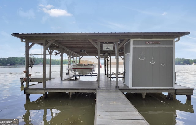 172B Hummingbird Ln, Jackson, GA 30233 - dock area featuring boat lift and a water view