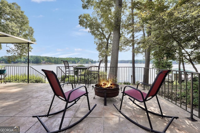 172B Hummingbird Ln, Jackson, GA 30233 - view of patio / terrace featuring an outdoor fire pit and a water view